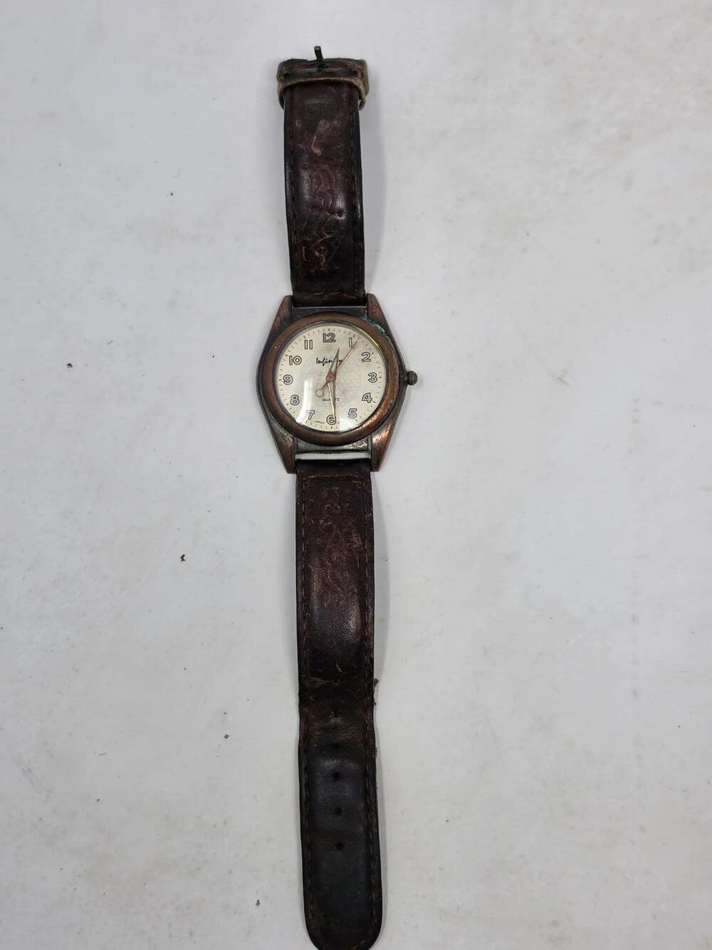 Infinity Quartz Wristwatch White Dial Stainless Steel Back Brown Strap